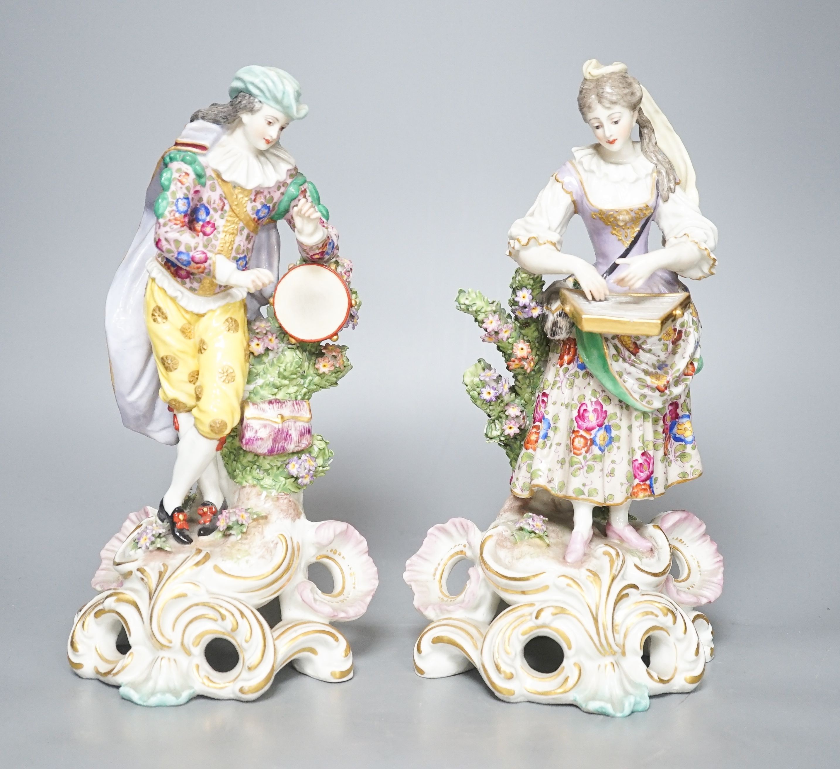 Two Continental porcelain figures, a lady and a gent 27cm